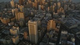 5K aerial stock footage tilt from downtown buildings to reveal and approach skyscrapers, Downtown San Francisco, California, twilight Aerial Stock Footage | AXSF14_007