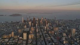5K aerial stock footage reverse view of Downtown San Francisco and San Francisco Bay, California, twilight Aerial Stock Footage | AXSF14_019