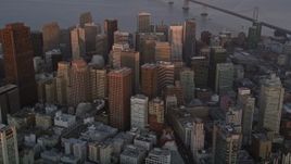 5K aerial stock footage approach and tilt to skyscrapers in Downtown San Francisco, California, sunset Aerial Stock Footage | AXSF14_025