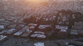 5K aerial stock footage tilt from North Beach apartments, reveal iconic Coit Tower, San Francisco, California, sunset Aerial Stock Footage | AXSF14_030