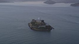 5K aerial stock footage of approaching Alcatraz island prison, San Francisco, California, twilight Aerial Stock Footage | AXSF14_032