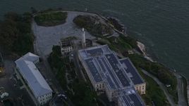 5K aerial stock footage orbit Alcatraz lighthouse and main building, San Francisco, California, twilight Aerial Stock Footage | AXSF14_035