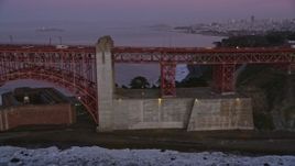 5K aerial stock footage flyby south side of the Golden Gate Bridge, downtown skyline in the background, San Francisco, California, twilight Aerial Stock Footage | AXSF14_057