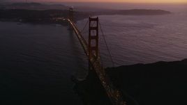 5K aerial stock footage flyby heavy traffic crossing the Golden Gate Bridge, San Francisco, California, twilight Aerial Stock Footage | AXSF14_079
