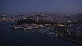 5K aerial stock footage flyby marina and Fort Mason, downtown skyline in the background, San Francisco, California, twilight Aerial Stock Footage | AXSF14_086