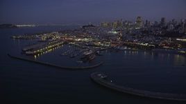 5K aerial stock footage of flying by iconic Fisherman's Wharf, San Francisco, California, twilight Aerial Stock Footage | AXSF14_087