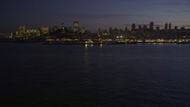 5K aerial stock footage low altitude approach to Pier 39 and skyline of Downtown San Francisco, California, twilight Aerial Stock Footage | AXSF14_094