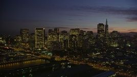 5K aerial stock footage of flying by tall city skyscrapers in Downtown San Francisco, California, twilight Aerial Stock Footage | AXSF14_097