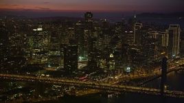 5K aerial stock footage of skyscrapers seen from Bay Bridge, Downtown San Francisco, California, twilight Aerial Stock Footage | AXSF14_110