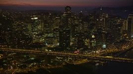5K aerial stock footage flyby heavy traffic on the Bay Bridge by Downtown San Francisco, California, night Aerial Stock Footage | AXSF14_111