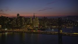 5K aerial stock footage of Downtown San Francisco skyscrapers and the Bay Bridge, California, twilight Aerial Stock Footage | AXSF14_112