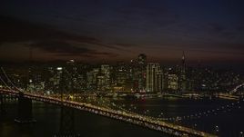 5K aerial stock footage of Downtown San Francisco and the Bay Bridge at night, California Aerial Stock Footage | AXSF14_135