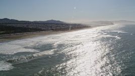 5K aerial stock footage of flying by Ocean Beach in Outer Richmond District, San Francisco, California Aerial Stock Footage | AXSF15_031
