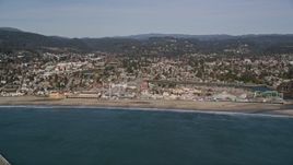 5K aerial stock footage of flying by the Santa Cruz Beach Boardwalk, Santa Cruz, California Aerial Stock Footage | AXSF15_098