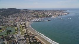 5K aerial stock footage tilt from US Naval Postgraduate School to reveal Monterey State Beach and Monterey, California Aerial Stock Footage | AXSF16_004