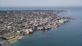 5K aerial stock footage approach coastal residential neighborhoods and Monterey Bay Aquarium, Monterey, California Aerial Stock Footage | AXSF16_006