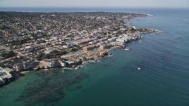 5K aerial stock footage tilt to reveal coastal neighborhoods and Monterey Bay Aquarium, Monterey, California Aerial Stock Footage | AXSF16_007