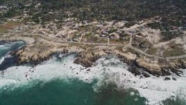 5K aerial stock footage of flying by coastal homes on Sunset Drive, Pacific Grove, California Aerial Stock Footage | AXSF16_017