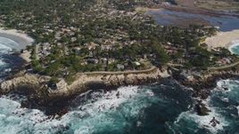 5K aerial stock footage tilt from the ocean to reveal a coastal residential neighborhood in Carmel, California Aerial Stock Footage | AXSF16_038