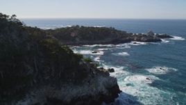 5K aerial stock footage of rounding rugged coastal cliffs in Carmel, California Aerial Stock Footage | AXSF16_046