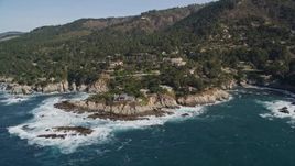 5K aerial stock footage of flying away from oceanfront mansions in Carmel, California Aerial Stock Footage | AXSF16_050