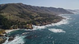 5K aerial stock footage flyby waves crashing below coastal homes and tilt up to the coastline, Carmel, California Aerial Stock Footage | AXSF16_052