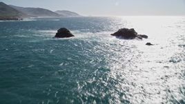 5K aerial stock footage of tilting from the ocean to reveal coastal rock formations, Carmel, California Aerial Stock Footage | AXSF16_053