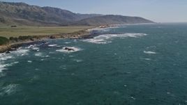 5K aerial stock footage tilt from ocean to reveal wide view of the coastline, Big Sur, California Aerial Stock Footage | AXSF16_090