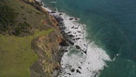 5K aerial stock footage approach and tilt to waves and coastal cliffs, Big Sur, California Aerial Stock Footage | AXSF16_109