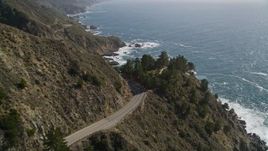 5K aerial stock footage of following Highway 1 atop coastal cliffs, Big Sur, California Aerial Stock Footage | AXSF16_116