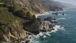 5K aerial stock footage of flying over rock formations and coastal cliffs, Big Sur, California Aerial Stock Footage | AXSF16_118