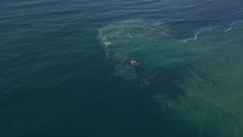 5K aerial stock footage reverse view of the calm waters of the Pacific Ocean Aerial Stock Footage | AXSF16_127