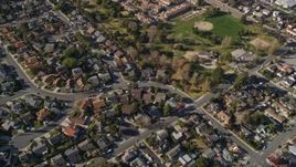 5K aerial stock footage reverse view of suburban neighborhoods, reveal Meadow Park, San Luis Obispo, California Aerial Stock Footage | AXSF16_156