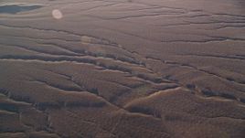 5K aerial stock footage of flying by deep cracks in the desert, Cuyama Valley, California Aerial Stock Footage | AXSF17_028