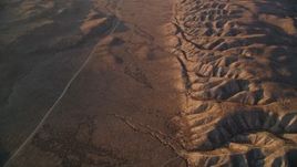 5K aerial stock footage reverse view of a desert road beside San Andreas Fault, San Luis Obispo County, California Aerial Stock Footage | AXSF17_052