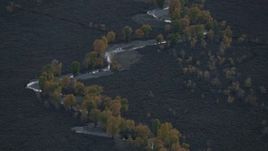 HD stock footage aerial video of a river and autumn trees in Jackson Hole, Wyoming, twilight Aerial Stock Footage | CAP_002_016