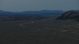 HD aerial stock footage video of light traffic on Highway 26, Jackson Hole, Wyoming, twilight Aerial Stock Footage | CAP_002_023