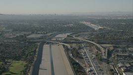 HD stock footage aerial video of freeway interchange and LA River in Lynwood, California Aerial Stock Footage | CAP_003_004