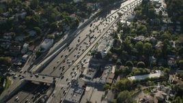 HD stock footage aerial video of a bird's eye view of traffic on the freeway in Universal City, California Aerial Stock Footage | CAP_004_007