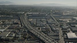 HD stock footage aerial video of light freeway traffic in Boyle Heights, Los Angeles, California Aerial Stock Footage | CAP_004_020