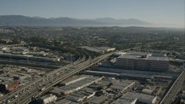 HD stock footage aerial video flyby light traffic on freeway through Boyle Heights, Los Angeles, California Aerial Stock Footage | CAP_004_021