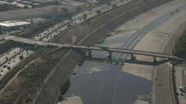 HD stock footage aerial video of a bridge spanning the LA River in Bell, California Aerial Stock Footage | CAP_004_028