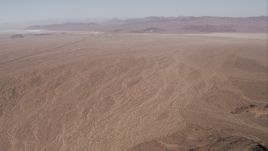 HD stock footage aerial video of a wider desert valley, Mojave Desert, California Aerial Stock Footage | CAP_005_023