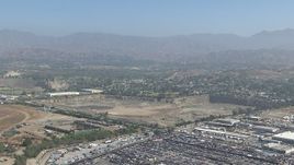 HD stock footage aerial video of approaching a landfill area in Sun Valley, California Aerial Stock Footage | CAP_006_002