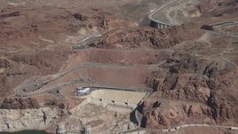 HD stock footage aerial video of light traffic on the Kingman Wash Access Road by Hoover Dam, Nevada Aerial Stock Footage | CAP_008_007