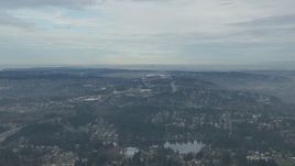 HD stock footage aerial video of Seattle Tacoma Airport and the Downtown Seattle skyline seen from I-5 and suburban neighborhoods, Washington Aerial Stock Footage | CAP_009_029