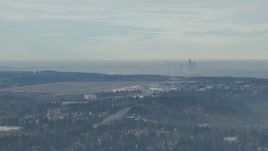 HD stock footage aerial video of Seattle Tacoma Airport and the Downtown Seattle skyline seen from south of the city, Washington Aerial Stock Footage | CAP_009_030