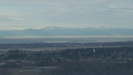 HD stock footage aerial video of the Olympic Mountains seen from the Seattle Tacoma Airport, Washington Aerial Stock Footage | CAP_009_034