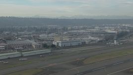 HD stock footage aerial video flyby the control tower and hangars at Boeing Field, Washington Aerial Stock Footage | CAP_009_042