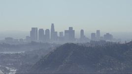 HD stock footage aerial video of a view of the Downtown Los Angeles skyline, reveal Silver Lake Reservoir, California Aerial Stock Footage | CAP_012_005